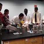 High School students carrying out experiment
