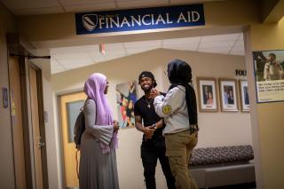 Students in the office of Financial Aid
