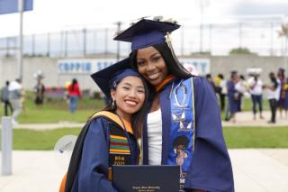 Two Coppin Graduates at Commencement 2021
