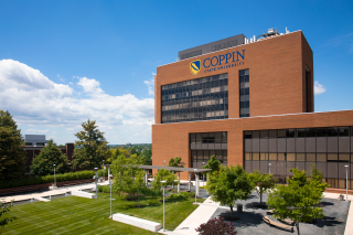CSU campus, Grace Jacobs building with Coppin logo.