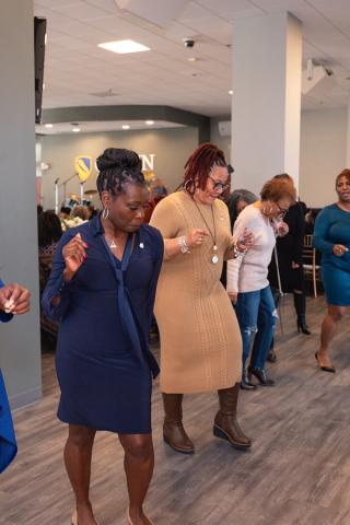 Attendees dance at the Homecoming Jazz Brunch