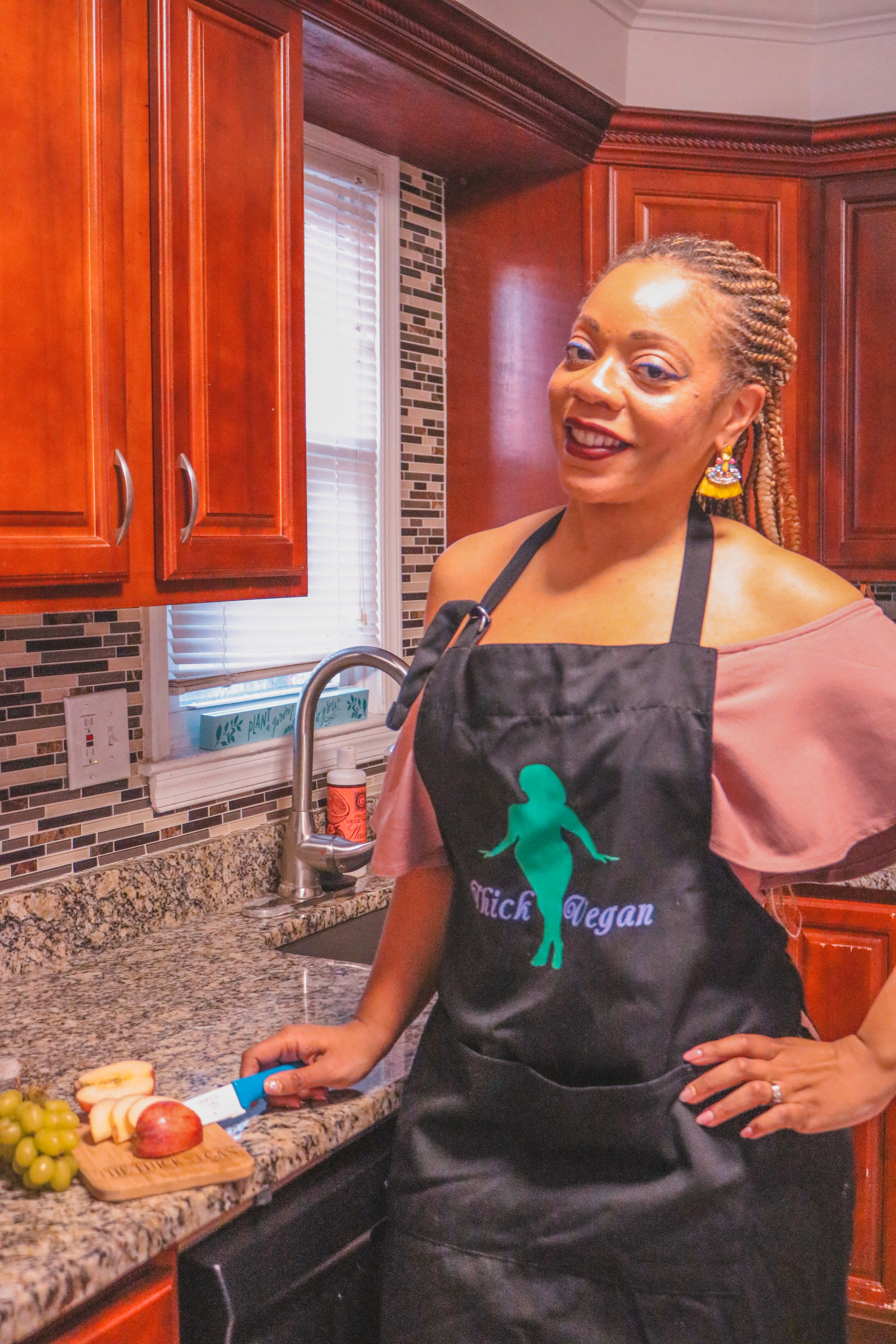 Trichelle in her Thick Vegan apron