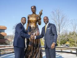 Sculpture artist, Rev. Frederick Hightower, with President Jenkins.