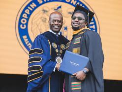 President Anthony L. Jenkins with a 2024 Graduate 