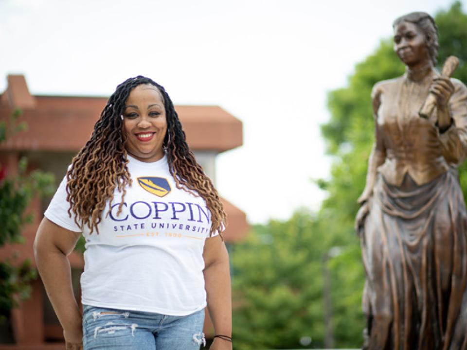A student at the Fanny Jackson Coppin Statue