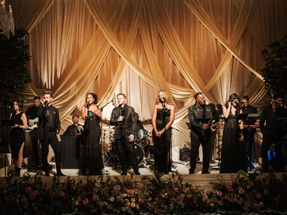 Stock image of band on fancy stage.