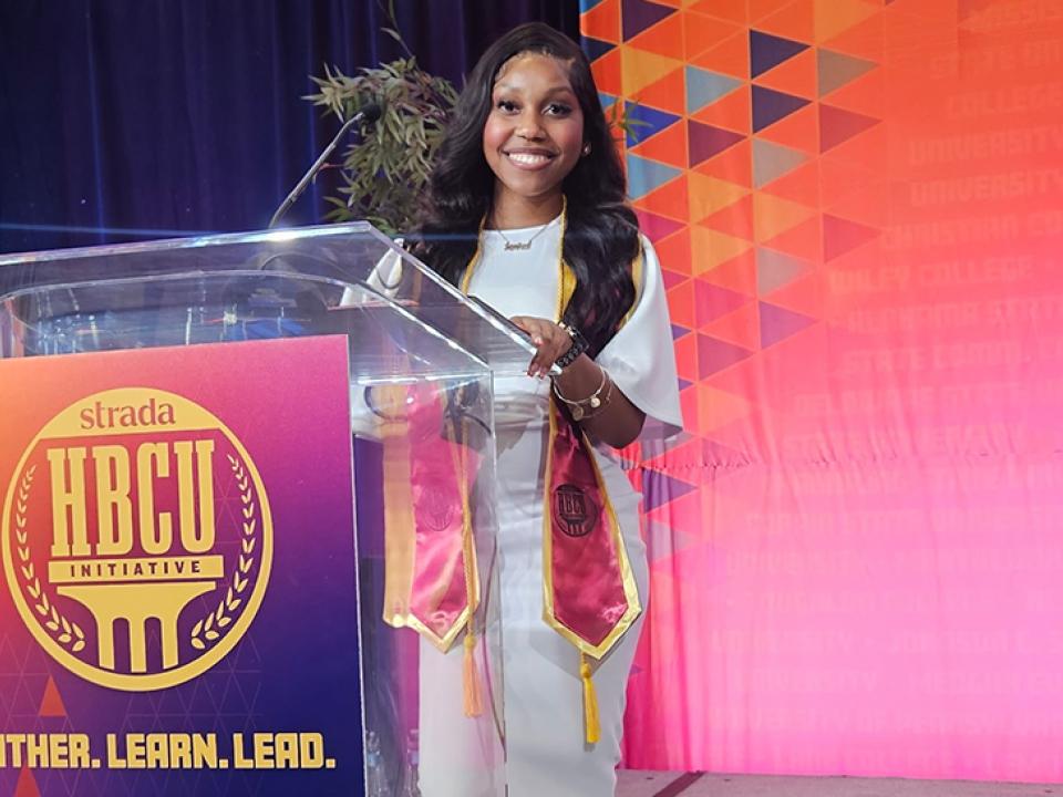 Janiya Camphor, Health Information Systems major, celebrates becoming the first graduate of the Coppin Strada Program at Coppin State University in May 2026.