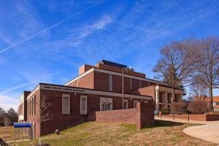 Red brick exterior of the James Weldon Johnson Auditorium on the campus Coppin State University