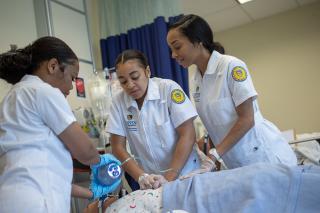 Coppin student nurses in the simulation lab