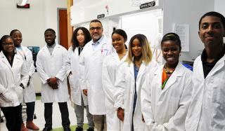 Science students with Dr. Hany F. Sobhi in the Center for Organic Synthesis