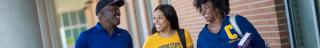 CSU Students walk outside the physical education complex