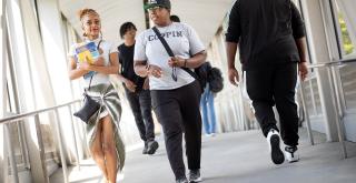 Coppin Students walk across the North Avenue bridge