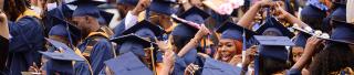 Graduates moving tassels