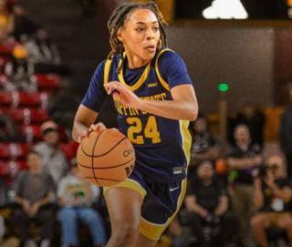 The player in the image is Khila Morris, a senior guard for the Coppin State Eagles.
