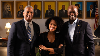 Travis Mitchell from MPT and Tetiana Anderson with Dr. Jenkins. 