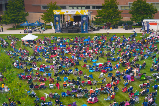 Overhead group photo during Coppin Summer Concert of the crowd and stage