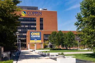 Grace Jacobs Building with One Coppin Signage on Coppin State's Campus 
